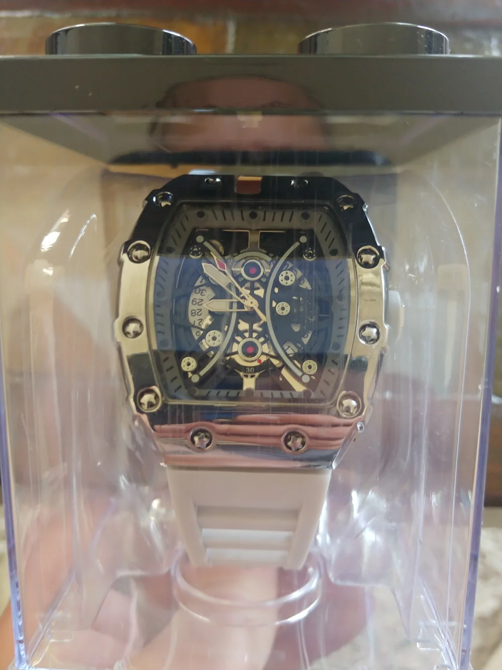 White and Silver Skeleton Sport Watch With Date.